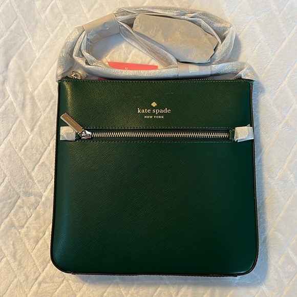 Green Kate Spade purse, brand new with tags and packaging, small blemish. - Picture 5 of 6